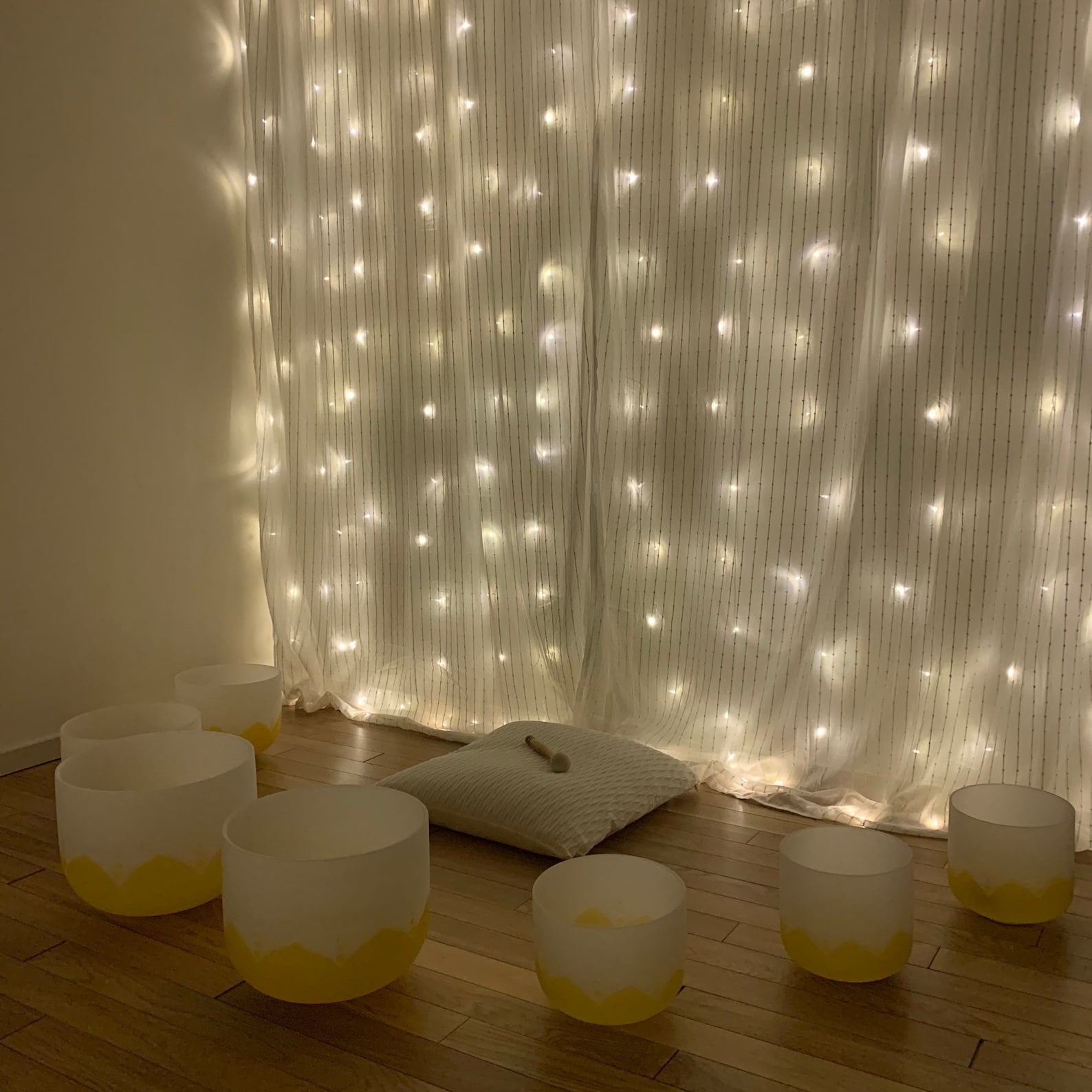 Full Chakra Set 'Inspired by the Sun' Set of 7 Chakra Bowls in front of lights