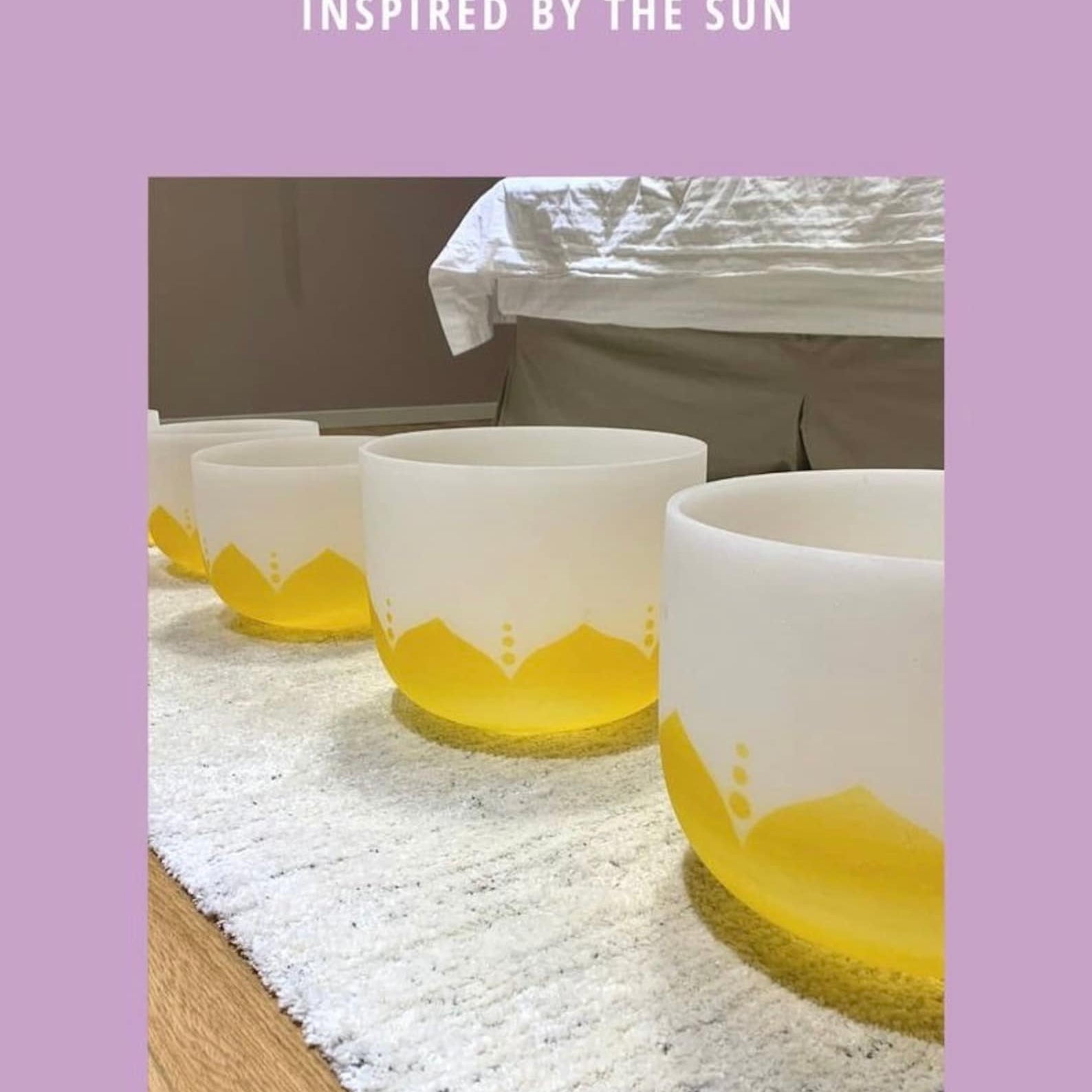 Full Chakra Set 'Inspired by the Sun' Set of 7 Chakra Bowls in front of lights