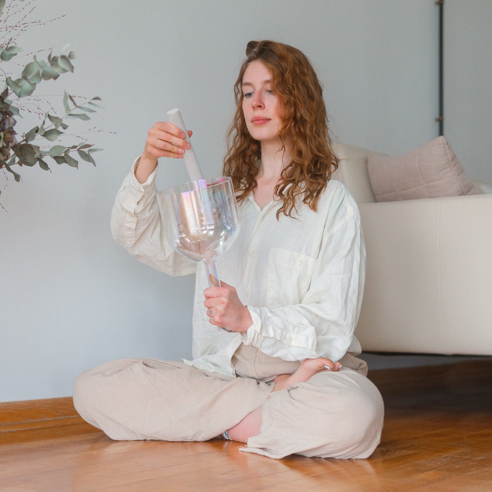 Girl with Cosmic Sound Bowls® Handheld Practitioner Bowl
