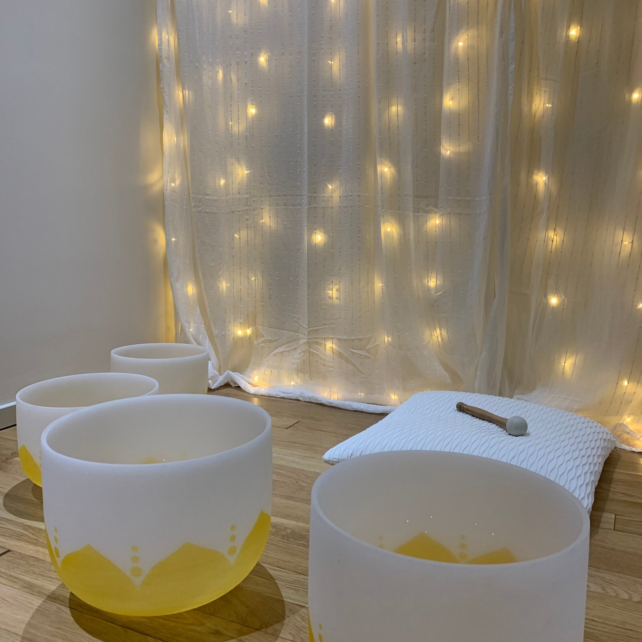 Full Chakra Set 'Inspired by the Sun' Set of 7 Chakra Bowls in front of lights