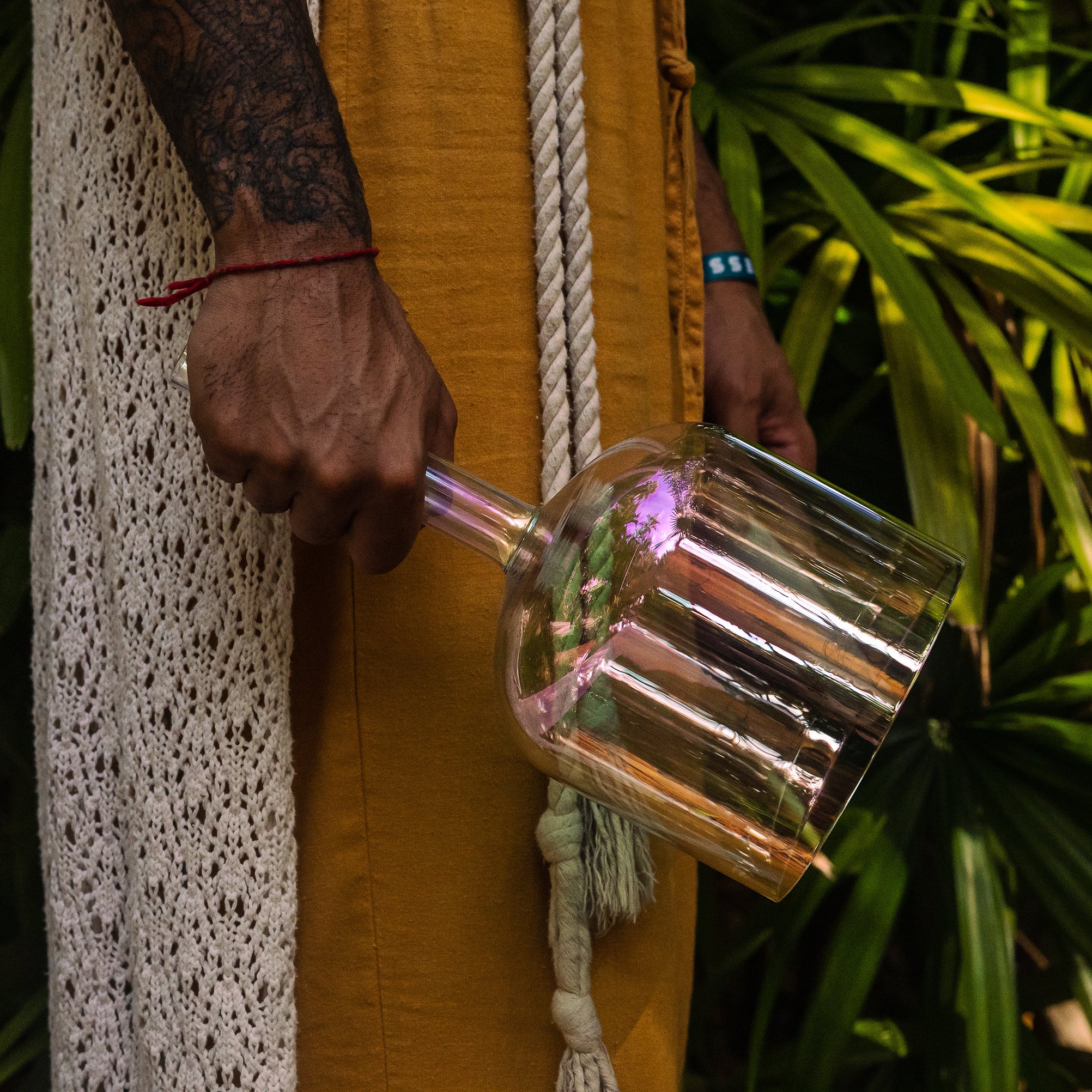 Mans hand holding a Handheld Practitioner Bowl