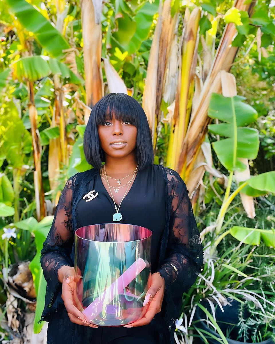 Girl holding Naturally Ground Cosmic Sound Bowl